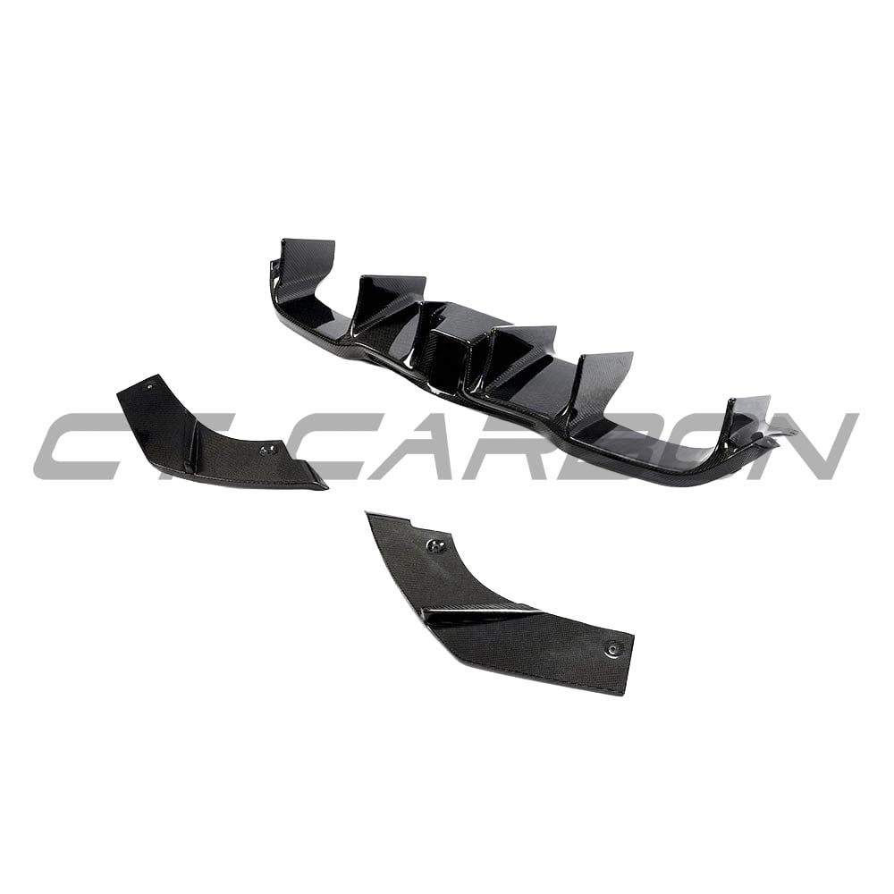 BMW M2 F87 carbon fibre diffuser by CT Carbon with an aggressive V6 design, showcasing sleek, lightweight aerodynamic styling.