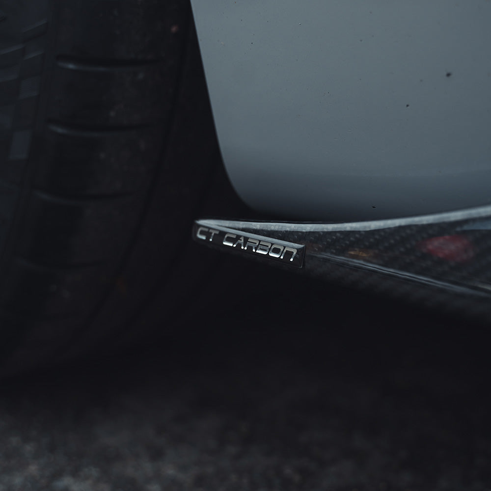 BMW M2 M2C F87 carbon fibre side skirts by CT Carbon, V2 style, featuring sleek, lightweight aerodynamic design.