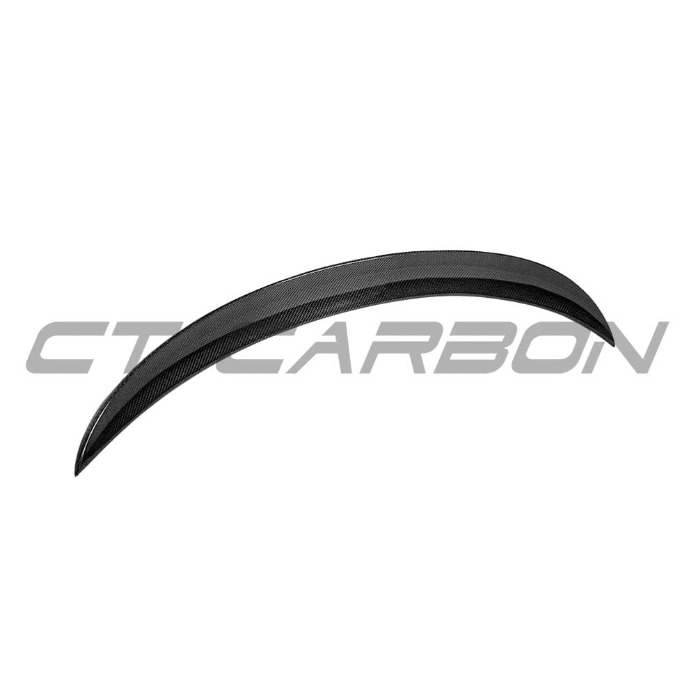 BMW M3 and 3 Series E90 carbon fiber spoiler by CT Carbon showing sleek, aerodynamic design on a silver sedan.