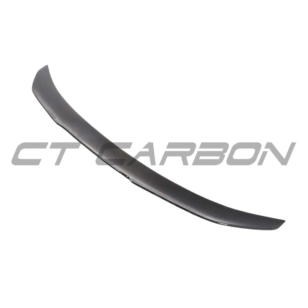 BMW M3 F80 and F30 3 Series carbon fiber spoiler by CT Carbon, V3 style, featuring a sleek ducktail design on a sports car.
