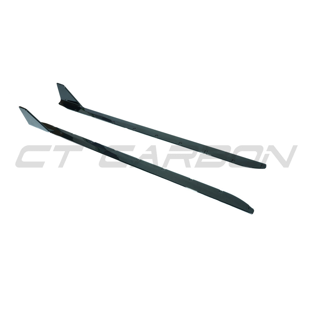 BMW M3 G80 G81 side skirts by CT Carbon in gloss black, installed on the vehicle, highlighting their sleek, aerodynamic design.