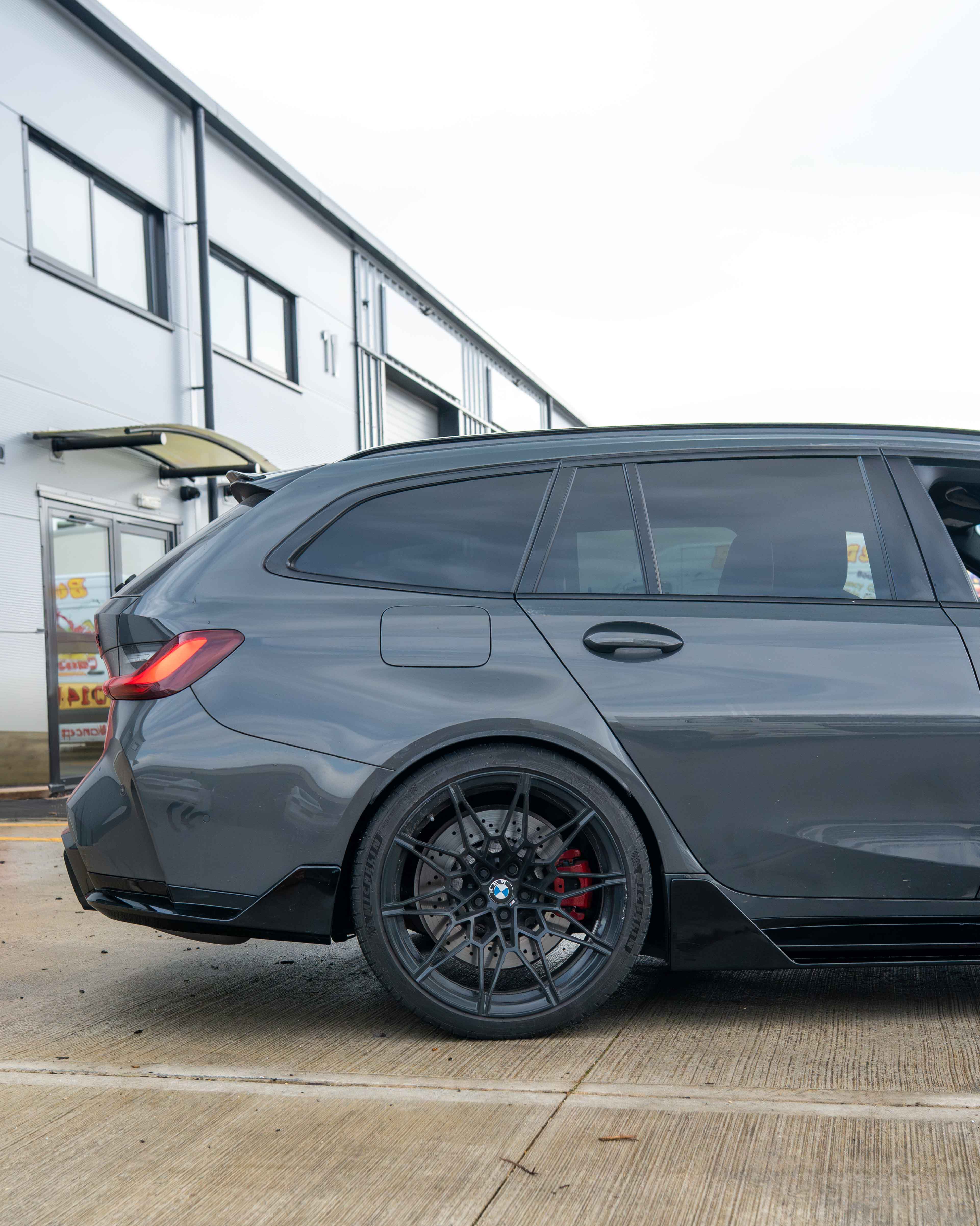 BMW M3 G80 G81 side skirts by CT Carbon in gloss black, V1 style, designed for enhanced aerodynamics and sporty appearance.