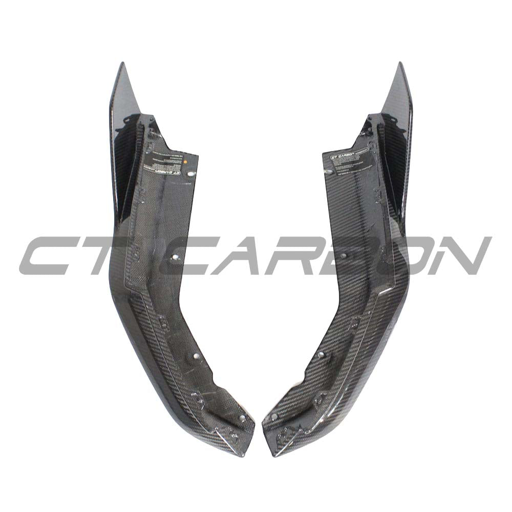 BMW G80 G81 M3 carbon fibre rear bumper corners by CT Carbon, close-up of lightweight, aerodynamic car accessory.