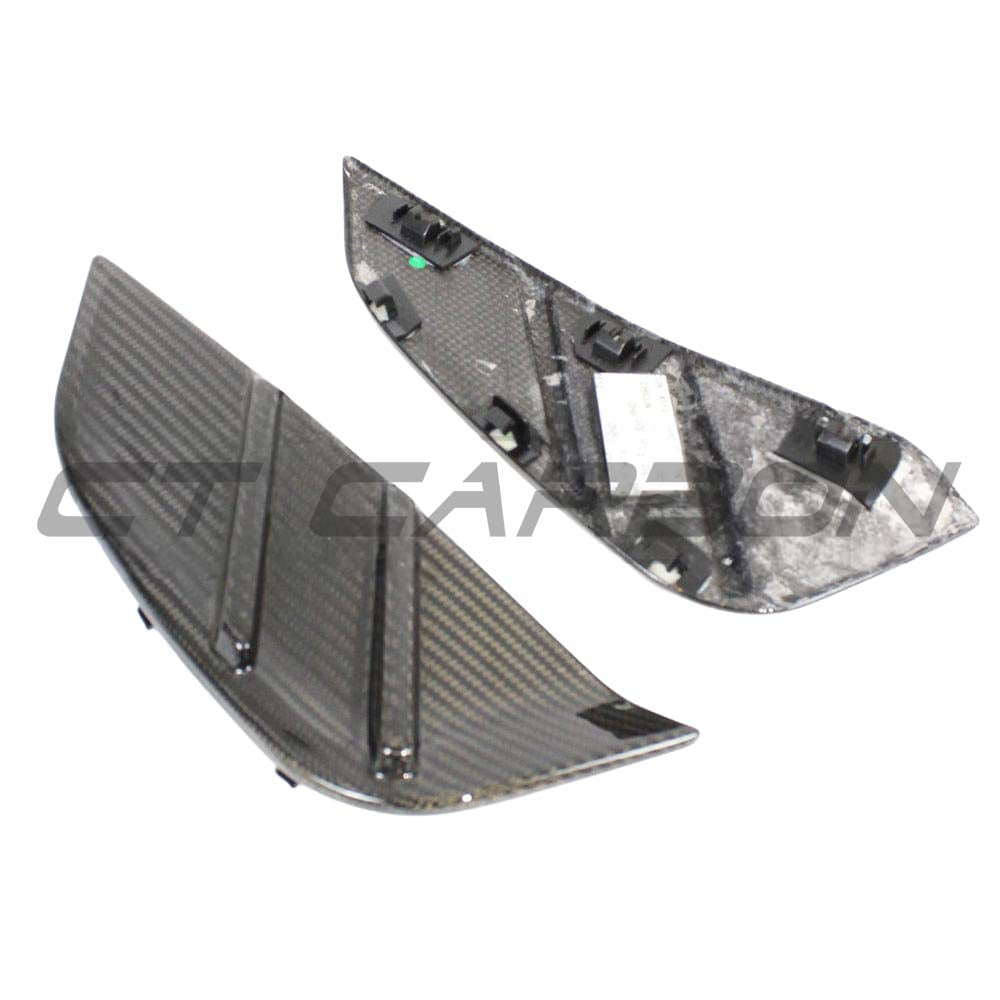 BMW M3 G80 G81 carbon fibre replacement side fender trim by CT Carbon, showcasing sleek, lightweight automotive accessory.