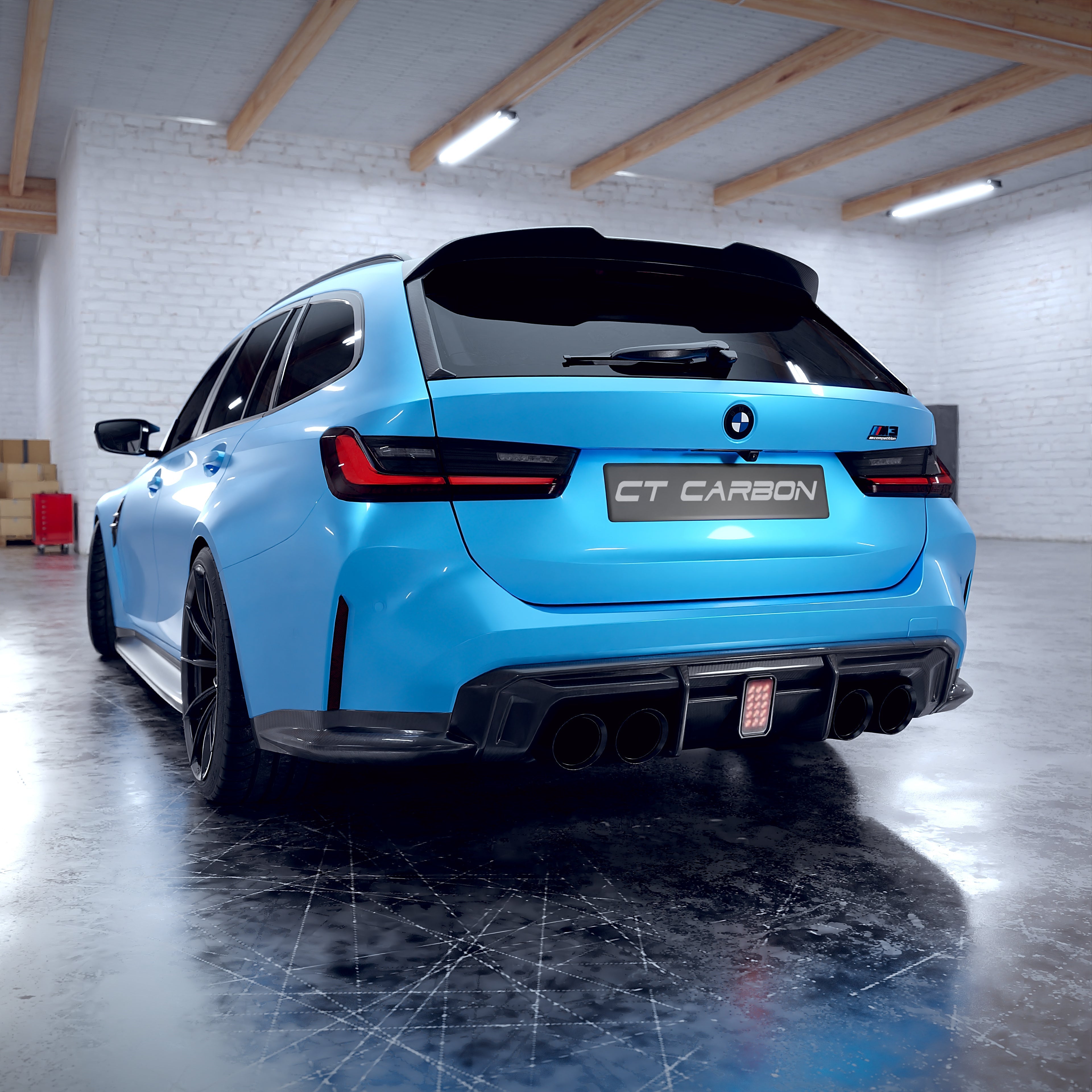 BMW M3 G81 carbon fibre spoiler by CT Carbon, showcasing the sleek aerodynamic design and glossy finish on the car.