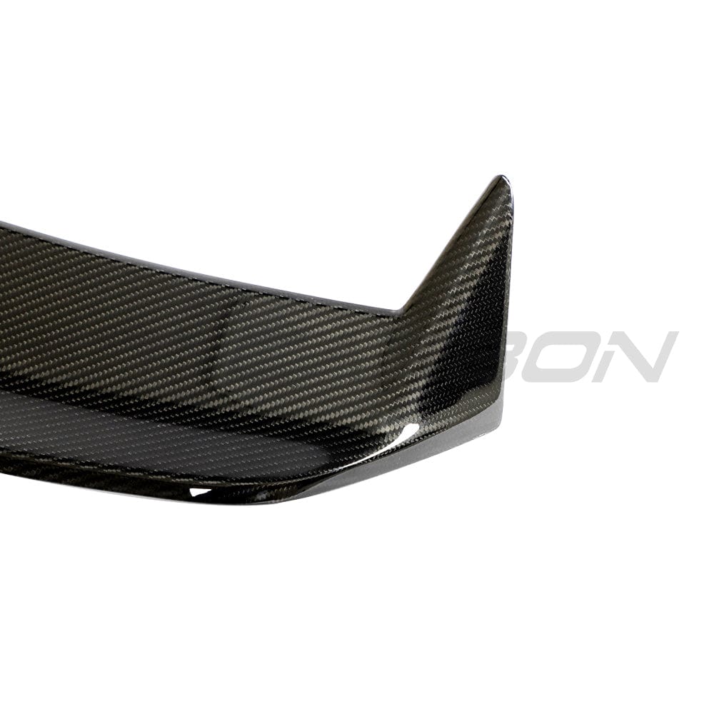 BMW G81 M3 Touring full carbon fibre kit by CT Carbon, featuring a sleek carbon fibre spoiler and aerodynamic components.