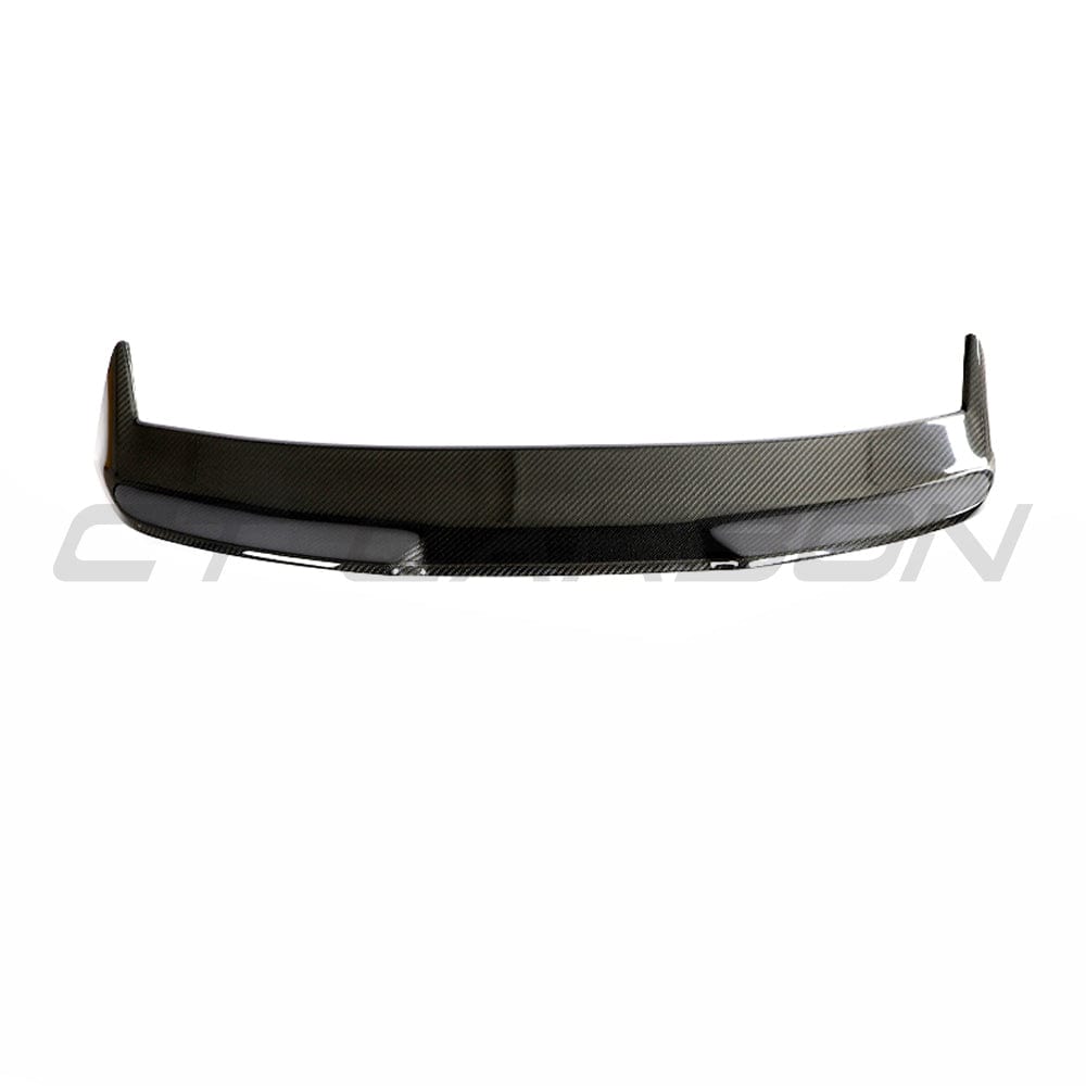 BMW G81 M3 Touring full carbon fibre kit by CT Carbon, featuring a sleek carbon fibre spoiler on a sporty M3 Touring.