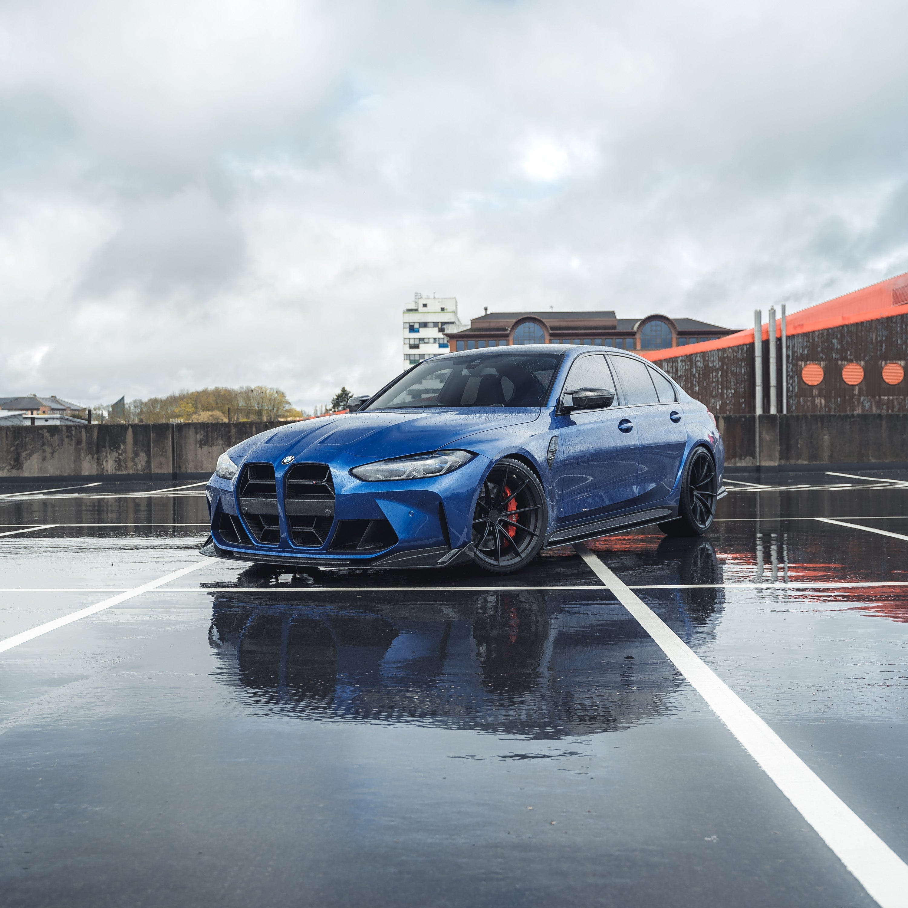 BMW M3 and M4 G80 G81 G82 G83 carbon fibre splitter by CT Carbon, showing the sleek, lightweight design and textured finish.
