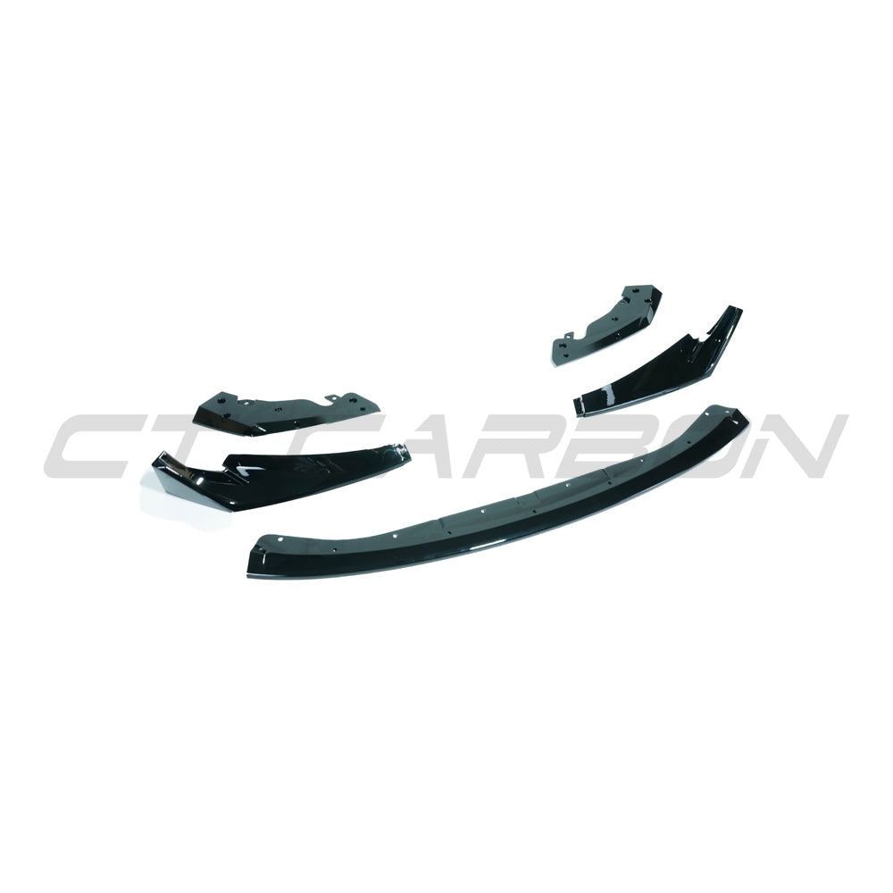 BMW M3 M4 G80 G81 G82 G83 gloss black splitter by CT Carbon, CSL style, mounted on front of the sporty coupe and sedan models.