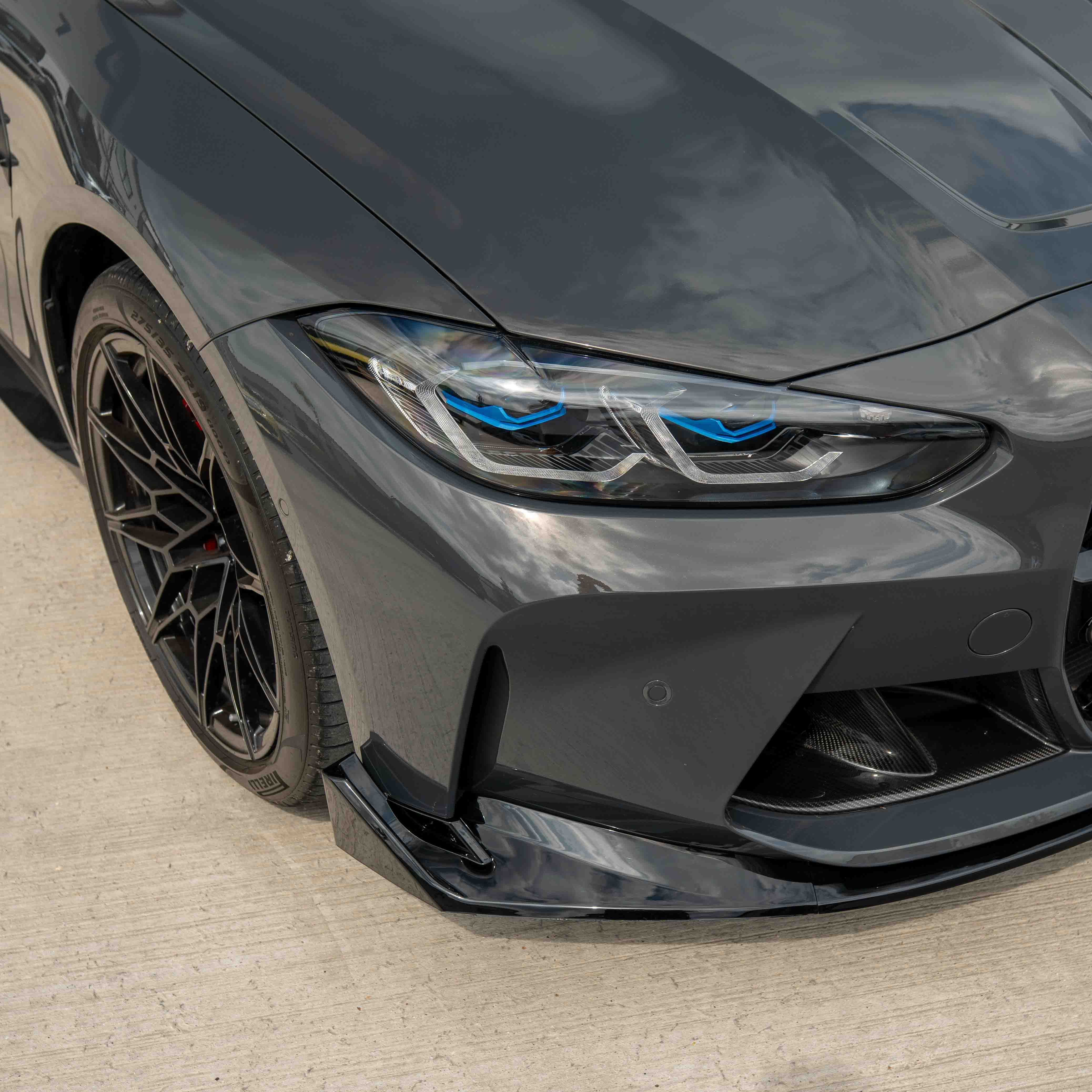 BMW M3 and M4 G80 G82 G81 G83 gloss black splitter by CT Carbon, styled like CSL, for aggressive front-end enhancement.
