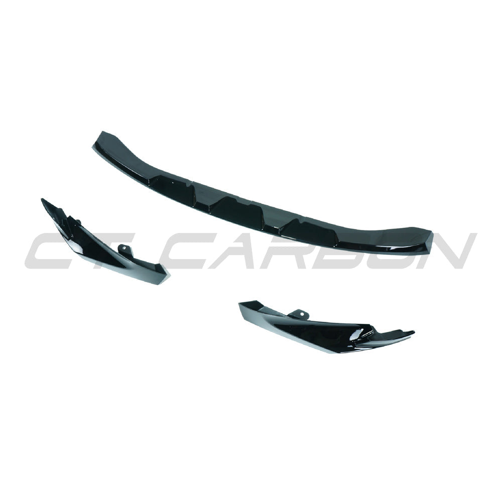BMW M3 M4 G80 G81 G82 G83 CT Carbon gloss black splitter, V2, mounted on front of the sports car with sleek design