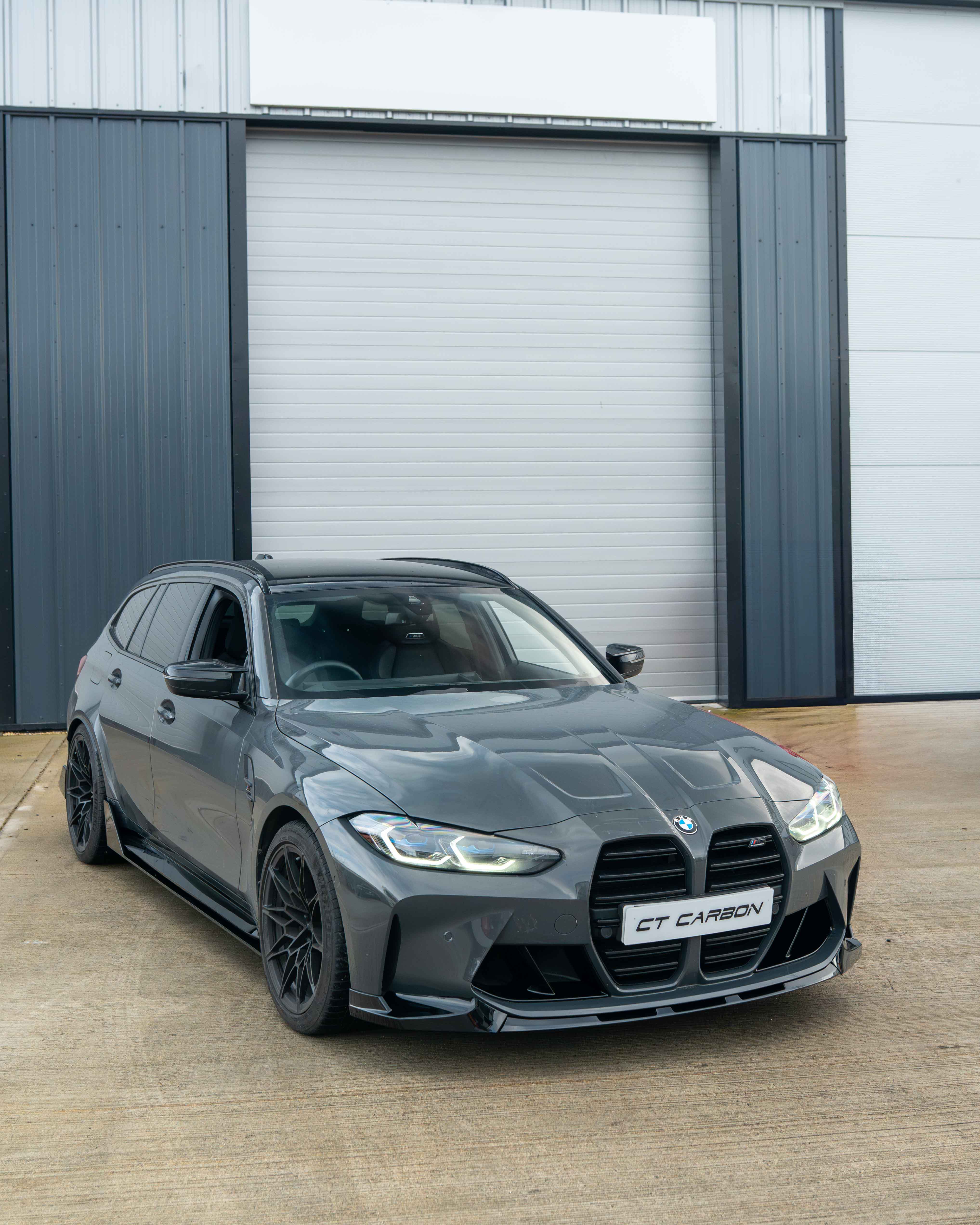 BMW M3 M4 G80 G81 G82 G83 CT Carbon gloss black splitter, V2, with sleek aerodynamic design and detailed finish.
