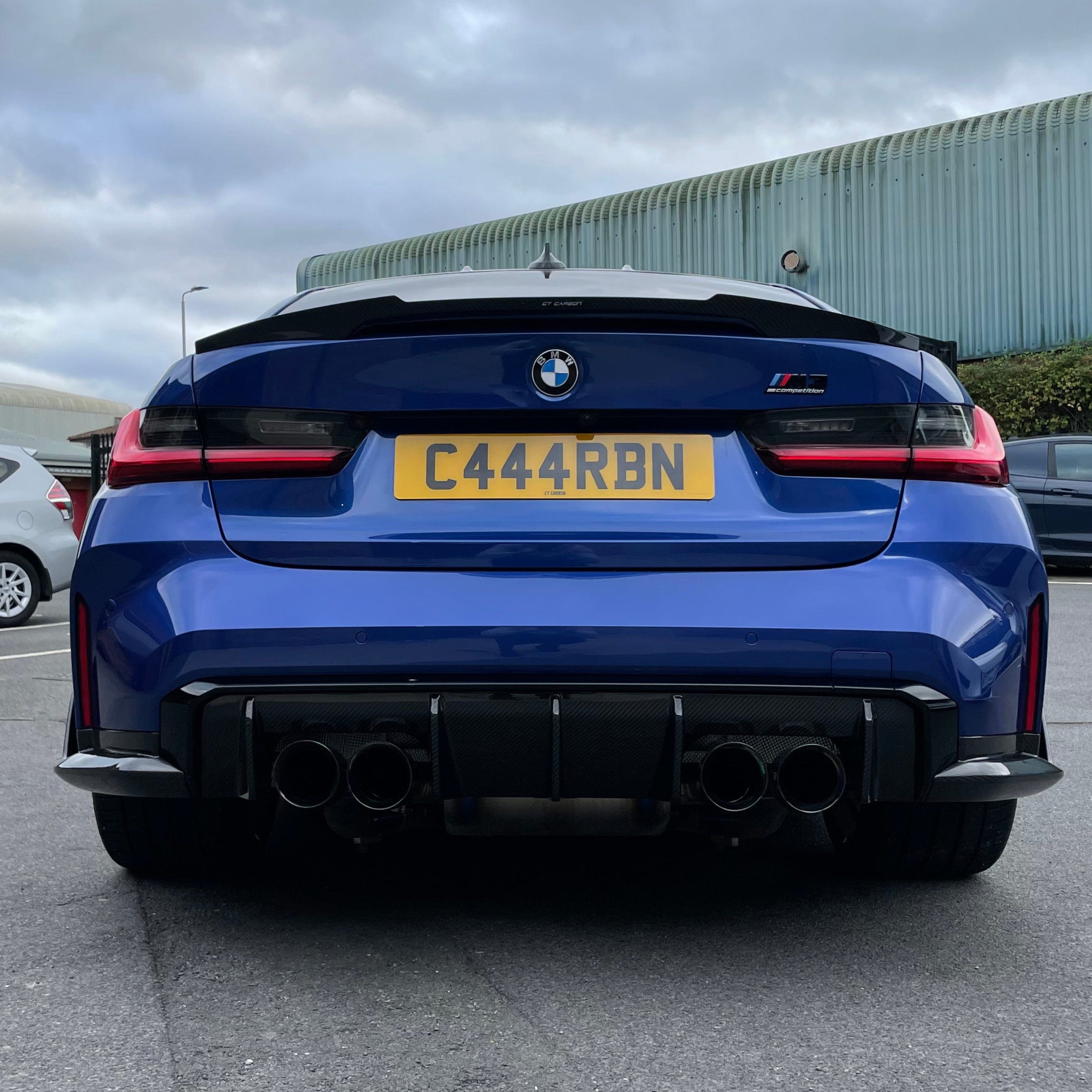 BMW M3 G80 G20 carbon fibre spoiler by CT Carbon, V8 style, showing the sleek, aerodynamic design on the car's rear.
