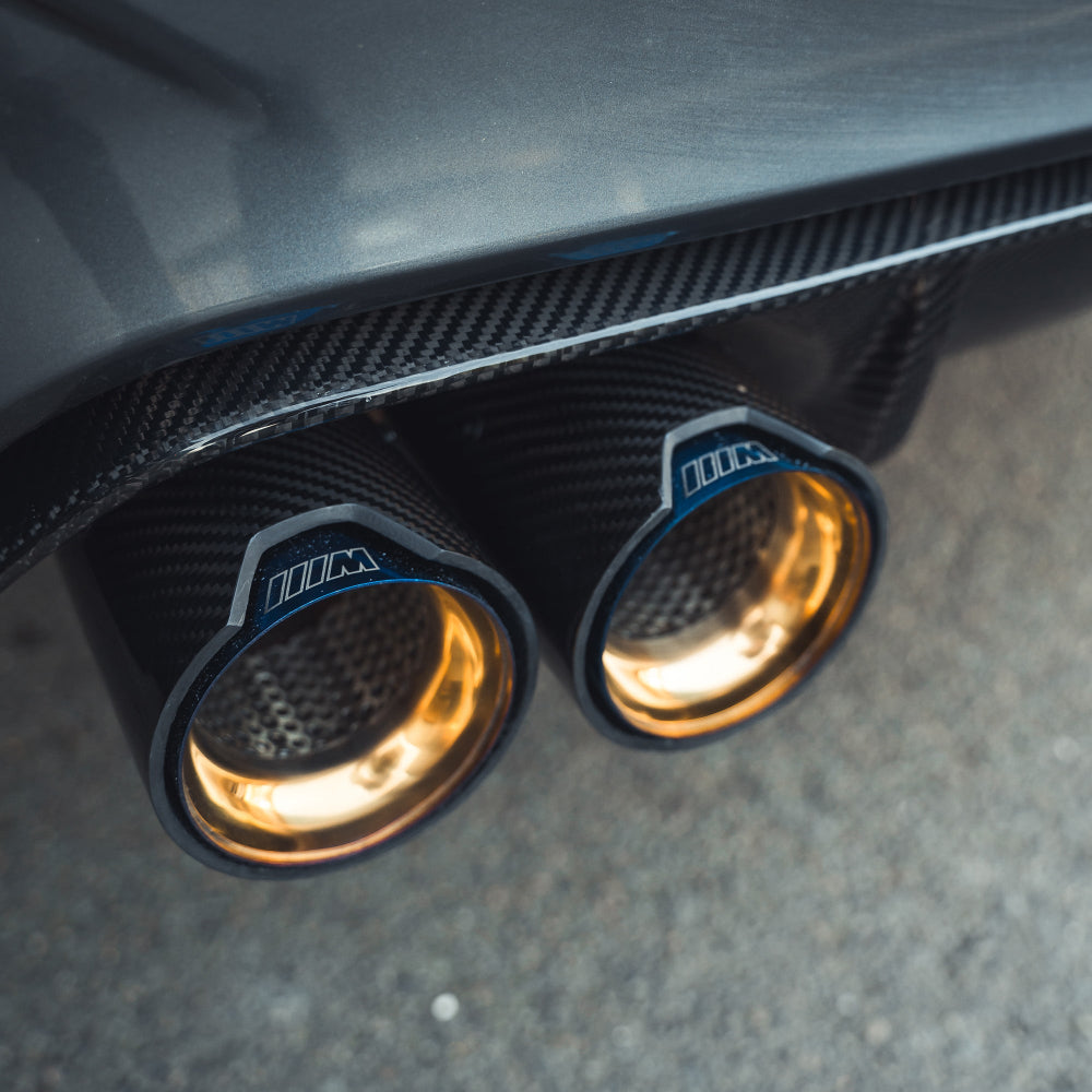 BMW M3 M4 F80 F82 F83 carbon fibre diffuser by CT Carbon, showcasing sleek V1 design with textured finish