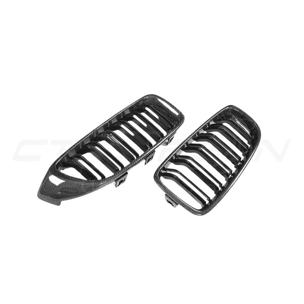 BMW M3 M4 F80 F82 F83 carbon fiber front grille by CT Carbon, showcasing the sleek, textured carbon fiber design on the grille.