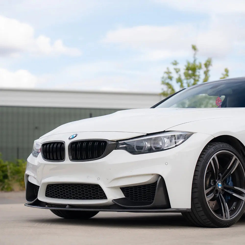 BMW M3 M4 F80 F82 F83 CT Carbon fiber front grille showing sleek black carbon fiber design and sporty grille pattern.