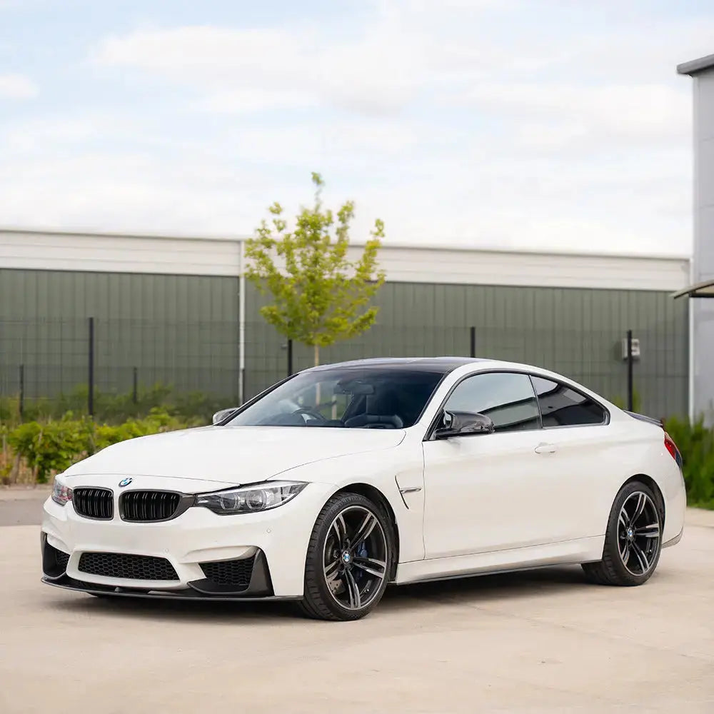 BMW M3 M4 F80 F82 F83 carbon fiber front grille by CT Carbon, showcasing sleek, lightweight automotive grille design.
