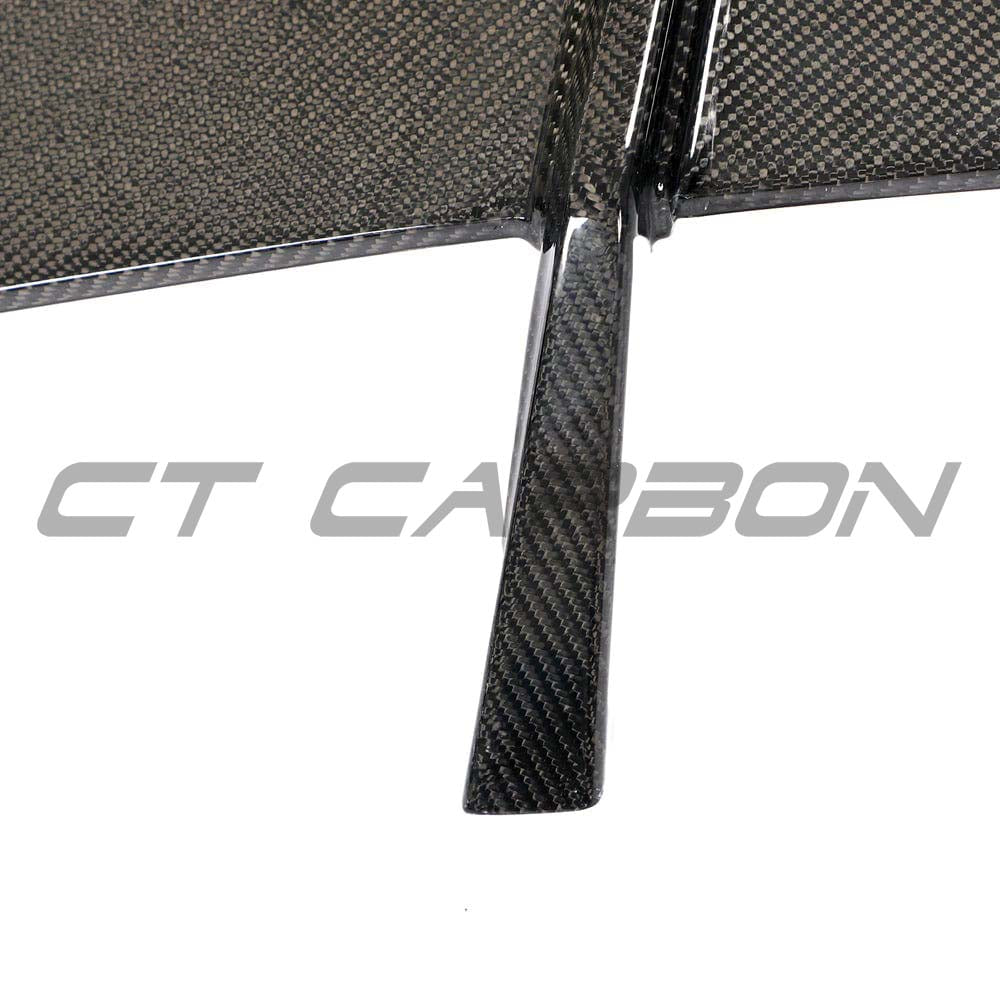 BMW G80 M3 and G82 M4 carbon fibre wing spoiler by CT Carbon, showcasing a sleek, aerodynamic design for sporty performance.