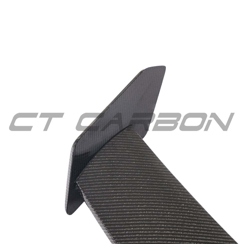 BMW G80 M3 and G82 M4 carbon fibre spoiler by CT Carbon, showcasing a sleek MP-style wing on the sports car.