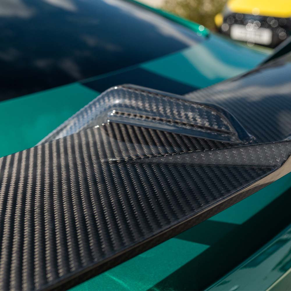 BMW G80 M3 and G82 M4 carbon fibre spoiler by CT Carbon, showing sleek MP-style wing on sporty coupe and sedan models.