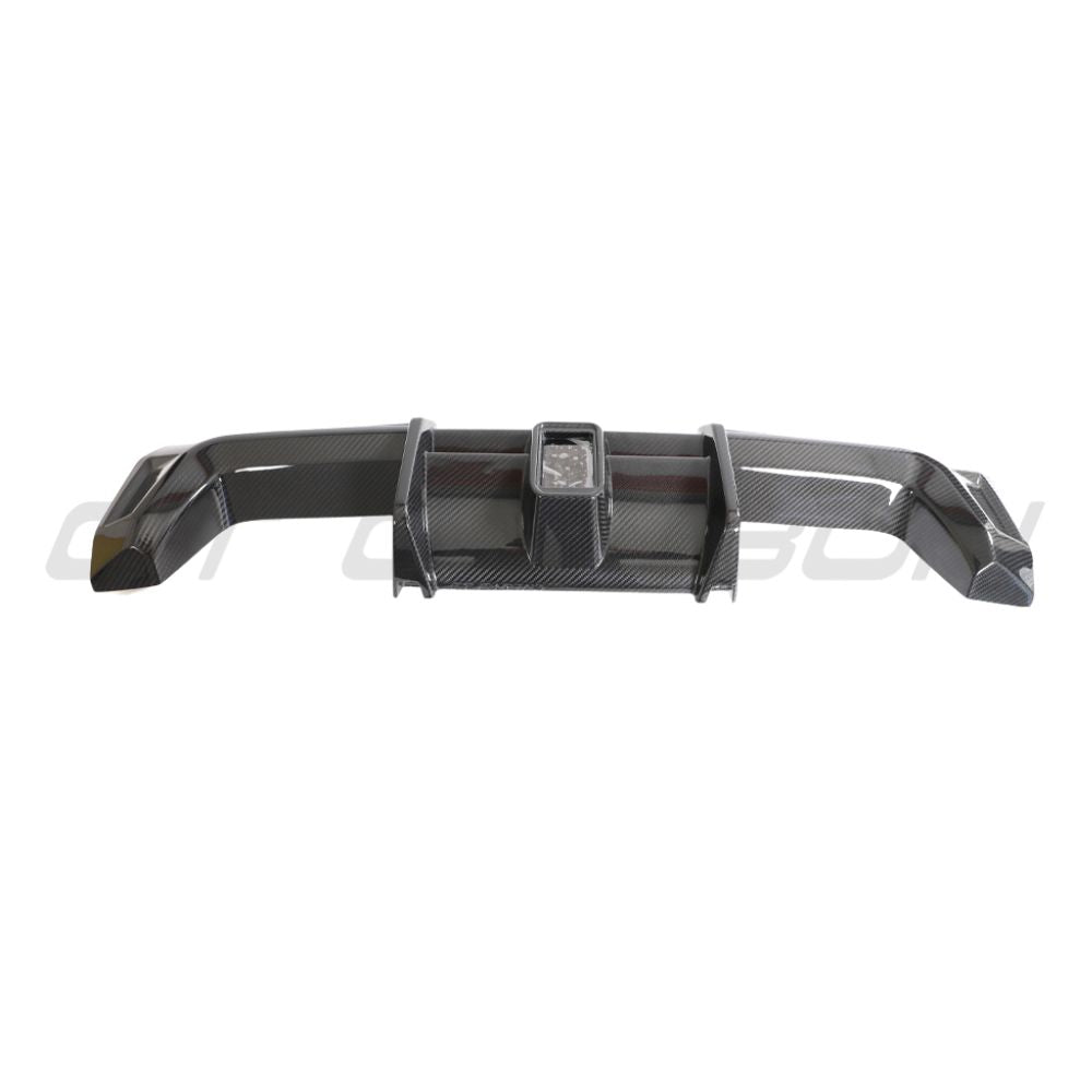 BMW M3 M4 G80 G82 carbon fibre diffuser with integrated LED lights, designed by CT Carbon for enhanced aerodynamics and style.
