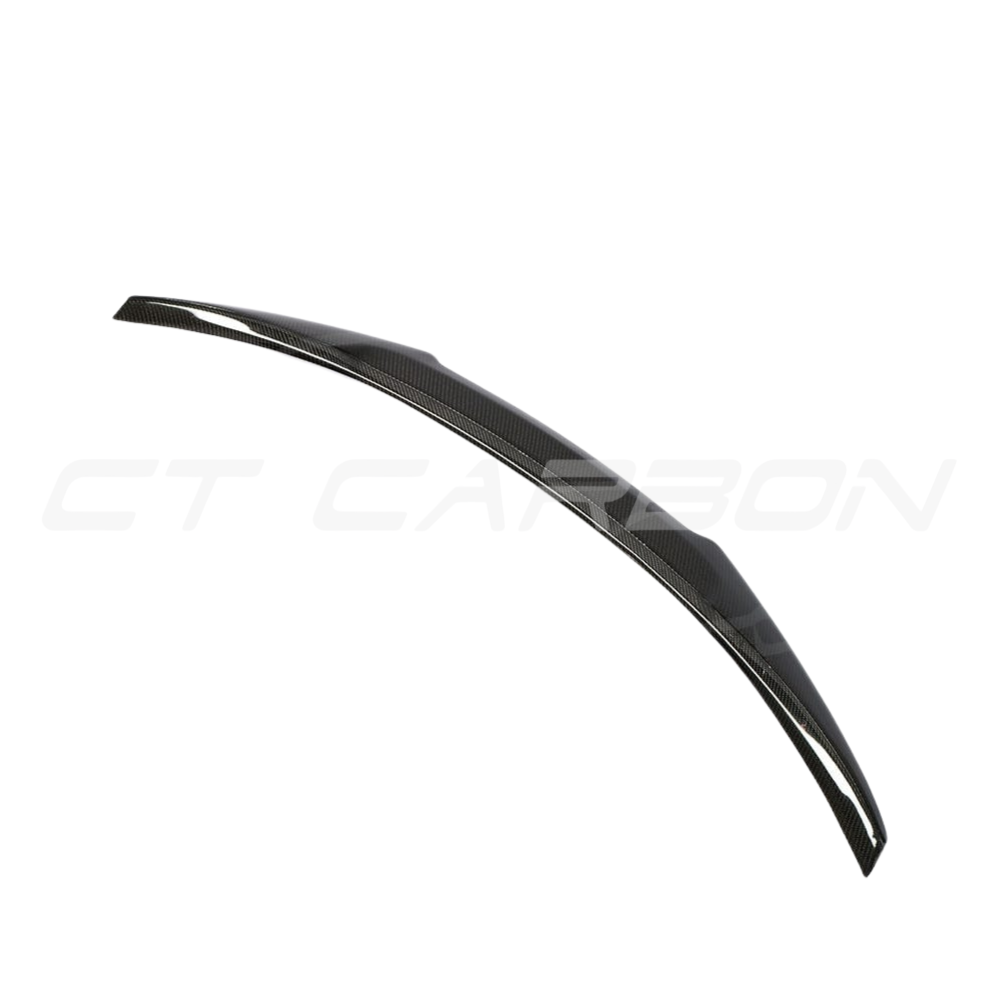 BMW M4 F82 carbon fibre V style spoiler by CT Carbon, showcasing the sleek, aerodynamic design on the car.