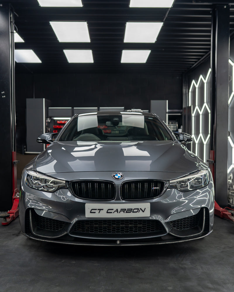 BMW F82 M4 Coupe 2014-2020 CT Carbon full carbon fiber kit, including front splitter, side skirts, and rear diffuser, MP style.