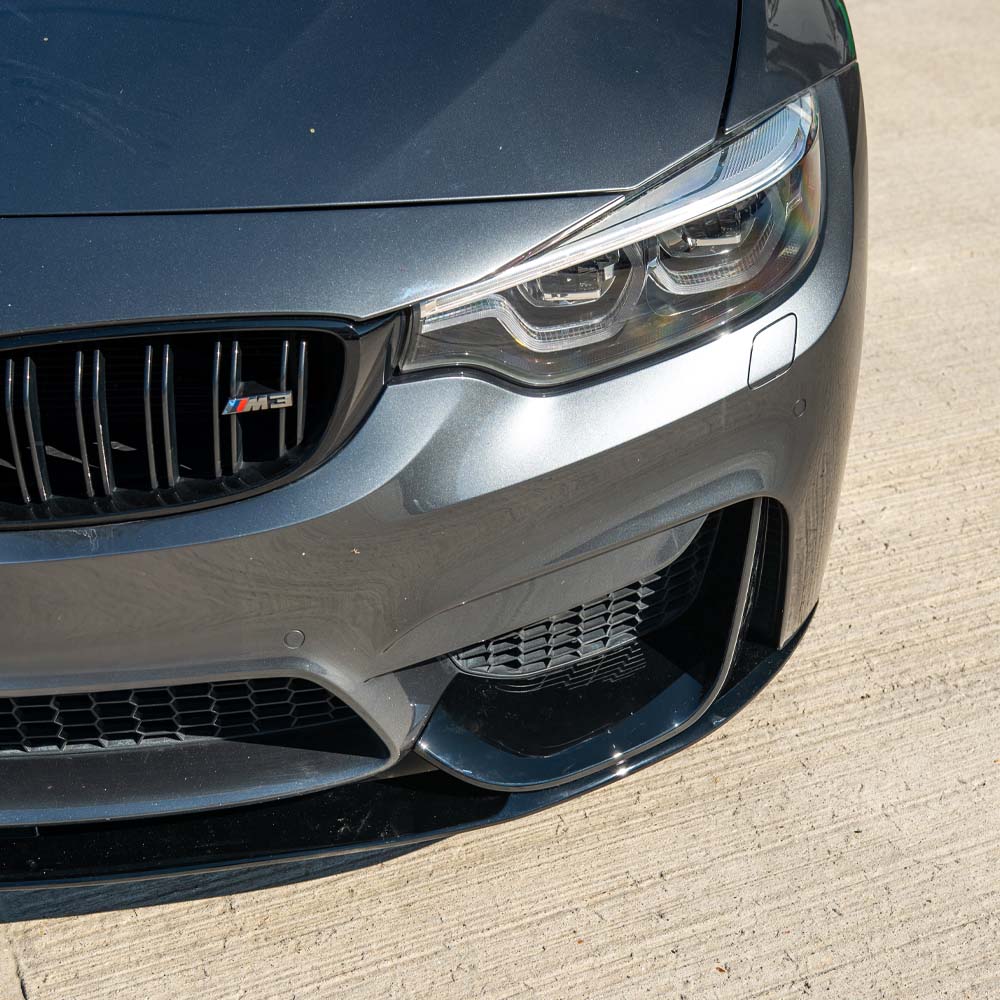 BMW M3 F80 2014-2020 CT Carbon full gloss black kit, showing exterior car parts with sleek black finish.