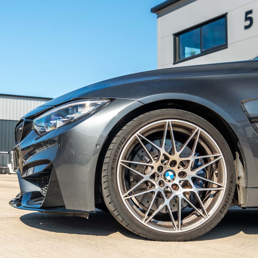 BMW M3 F80 2014-2020 full gloss black kit by CT Carbon, showing the sleek, glossy black exterior components on the coupe.