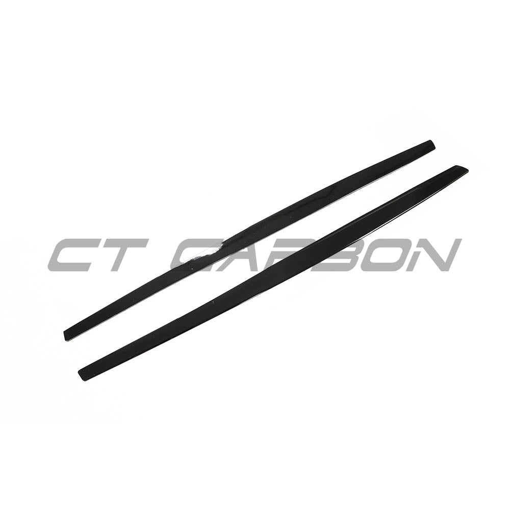 BMW M3 F80 full gloss black kit by CT Carbon, featuring sleek carbon fiber accents on the vehicle's exterior.