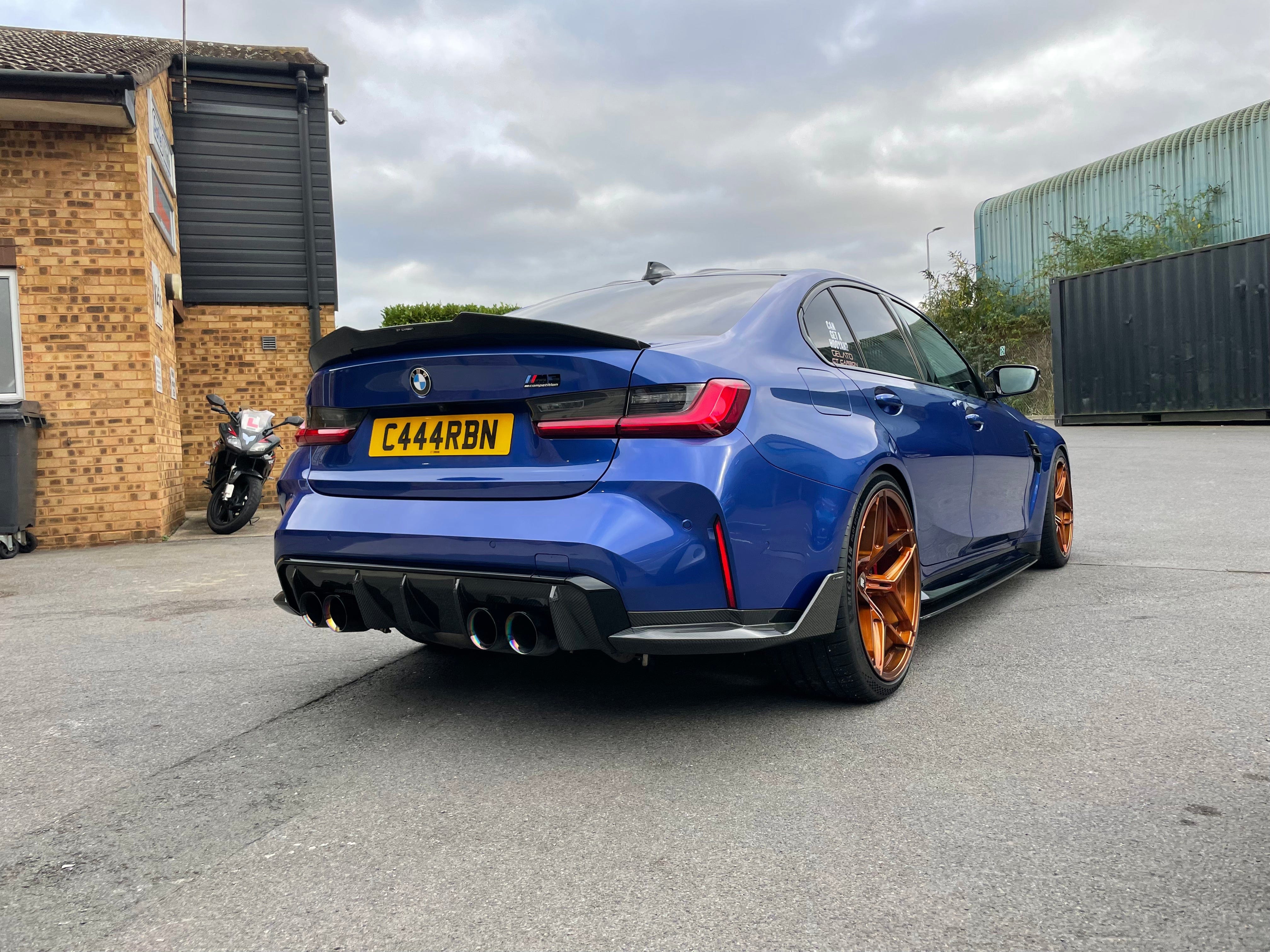 BMW M4 G82/G83 carbon fibre rear bumper corners by CT Carbon, V1, showcasing sleek, lightweight accessory design for enhanced performance.