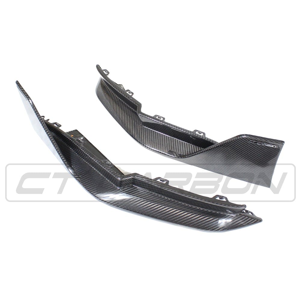 BMW M4 G82 G83 carbon fiber rear bumper corners by CT Carbon, V1 accessory, showcasing sleek, lightweight rear corner protection.