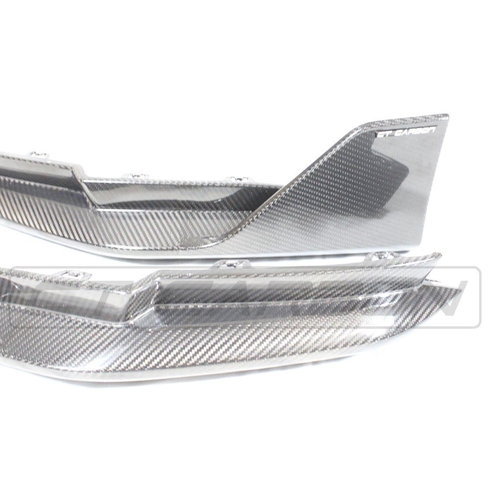 BMW M4 G82/G83 carbon fibre rear bumper corners by CT Carbon, showcasing sleek, lightweight accessory details.