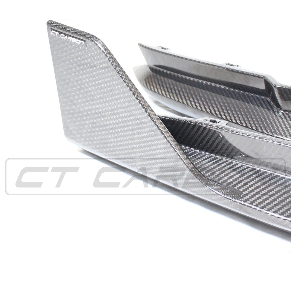 BMW M4 G82 G83 carbon fibre rear bumper corners from CT Carbon, showcasing sleek, lightweight accessory details.
