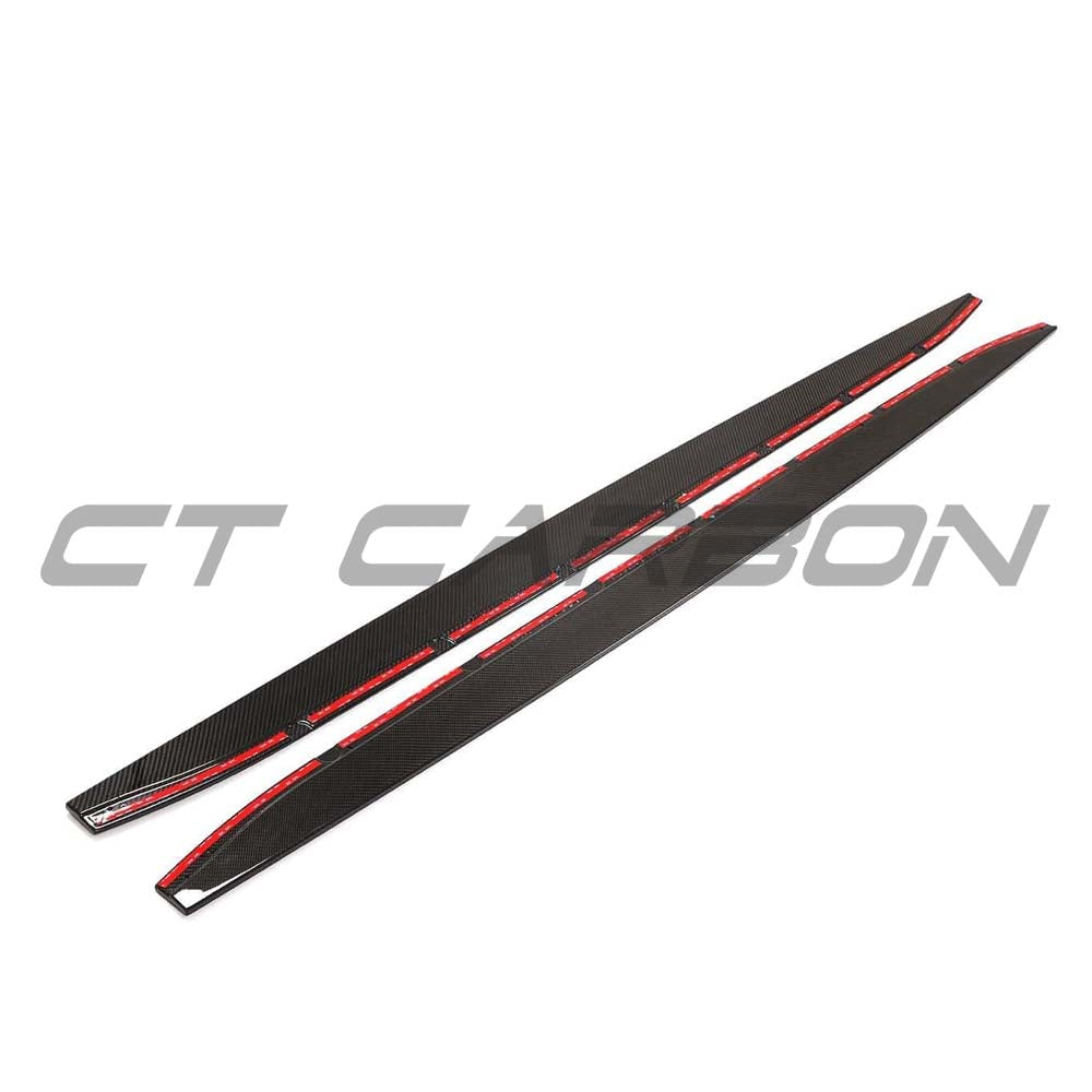 BMW G83 M4 full carbon fibre kit with side skirt extensions by CT Design, showcasing sleek, lightweight carbon fibre details.