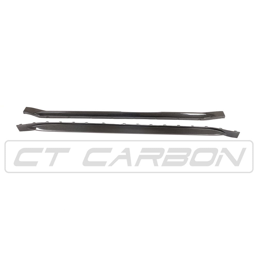 BMW M4 G82 G83 carbon fibre side skirt replacement by CT Design, showing sleek, lightweight side skirts with detailed carbon fiber finish.