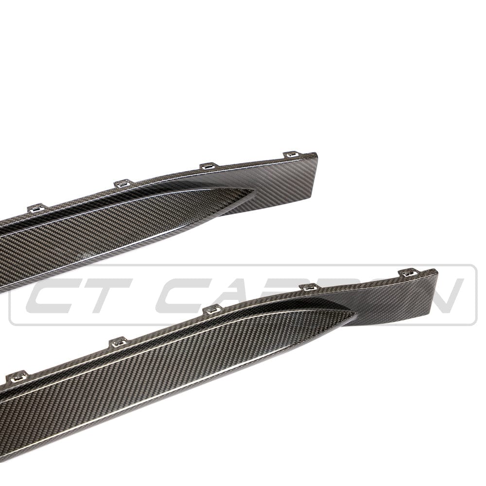 BMW M4 G82 G83 carbon fibre side skirt replacement by CT Design, showing the sleek, aerodynamic side skirt on the vehicle.
