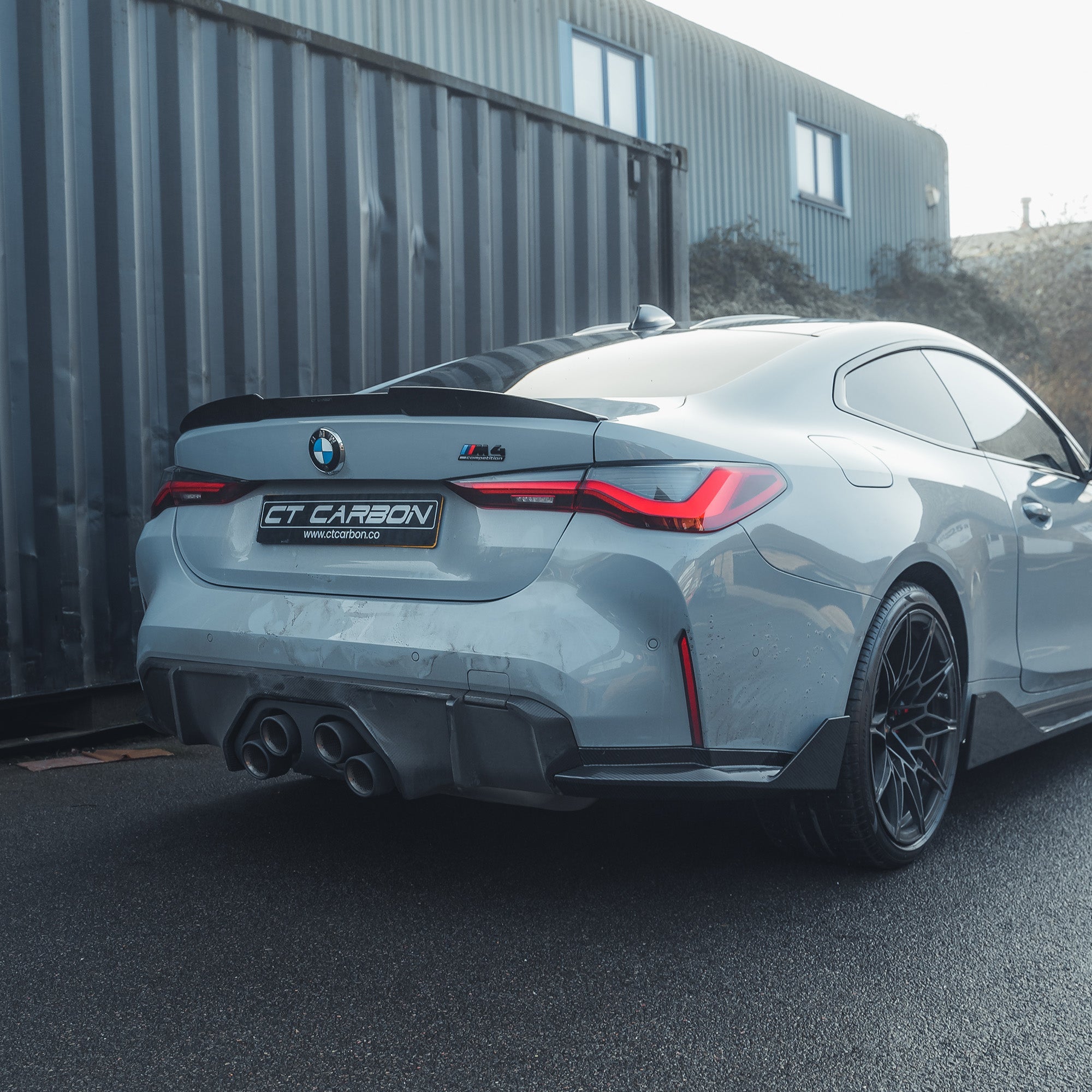 BMW M4 G82 G22 carbon fibre spoiler by CT Design, showcasing the sleek, aerodynamic V2 style on a sporty car.