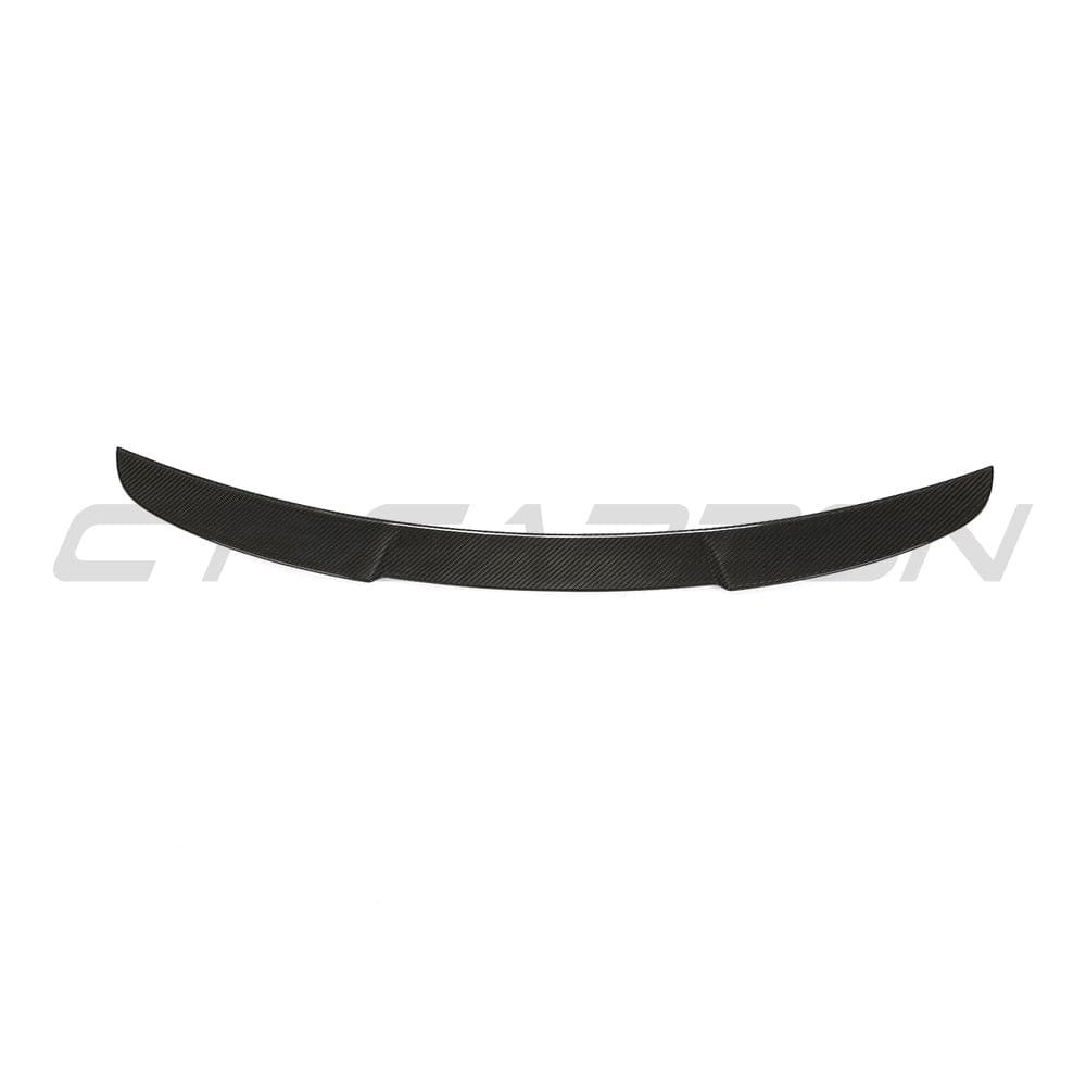 BMW G22 4 Series carbon fibre kit by CT Carbon, featuring M4-style spoiler with sleek carbon fibre finish.