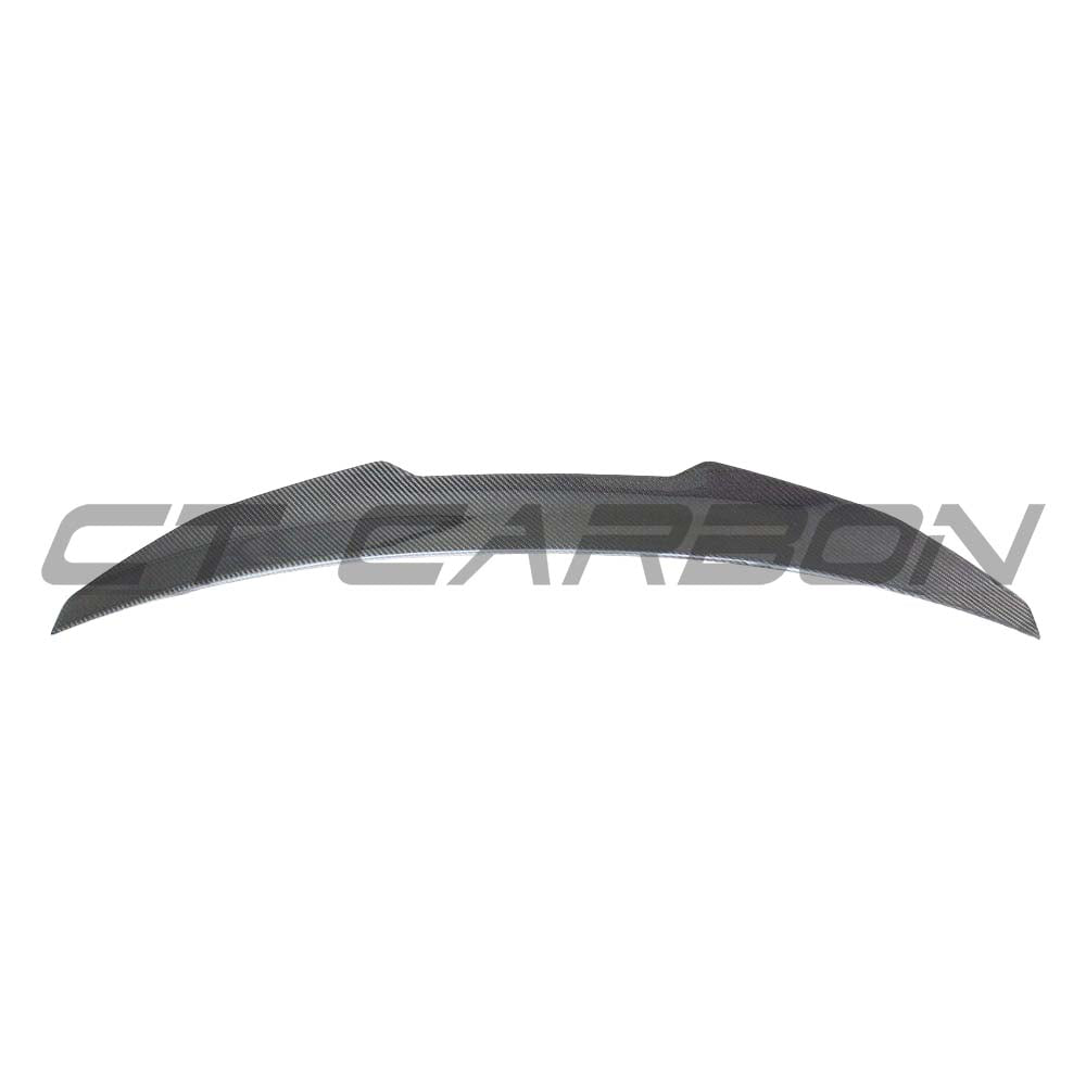 BMW G22 4 Series carbon fibre kit by CT Carbon, featuring V12 spoiler and PS style, shown on the car's rear view.