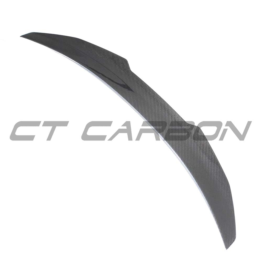 BMW G22 4 Series 2020+ Carbon Fibre Kit by CT Carbon, featuring a V12 spoiler in black carbon fibre with detailed design elements.
