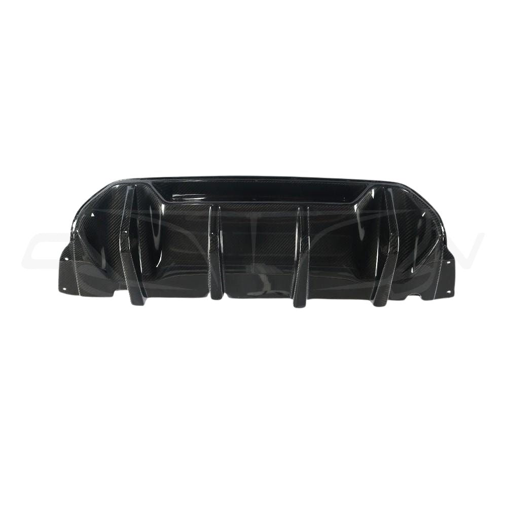 BMW M5 F90 carbon fibre diffuser by CT Carbon, V1, showcasing sleek, lightweight aerodynamic design for enhanced performance.