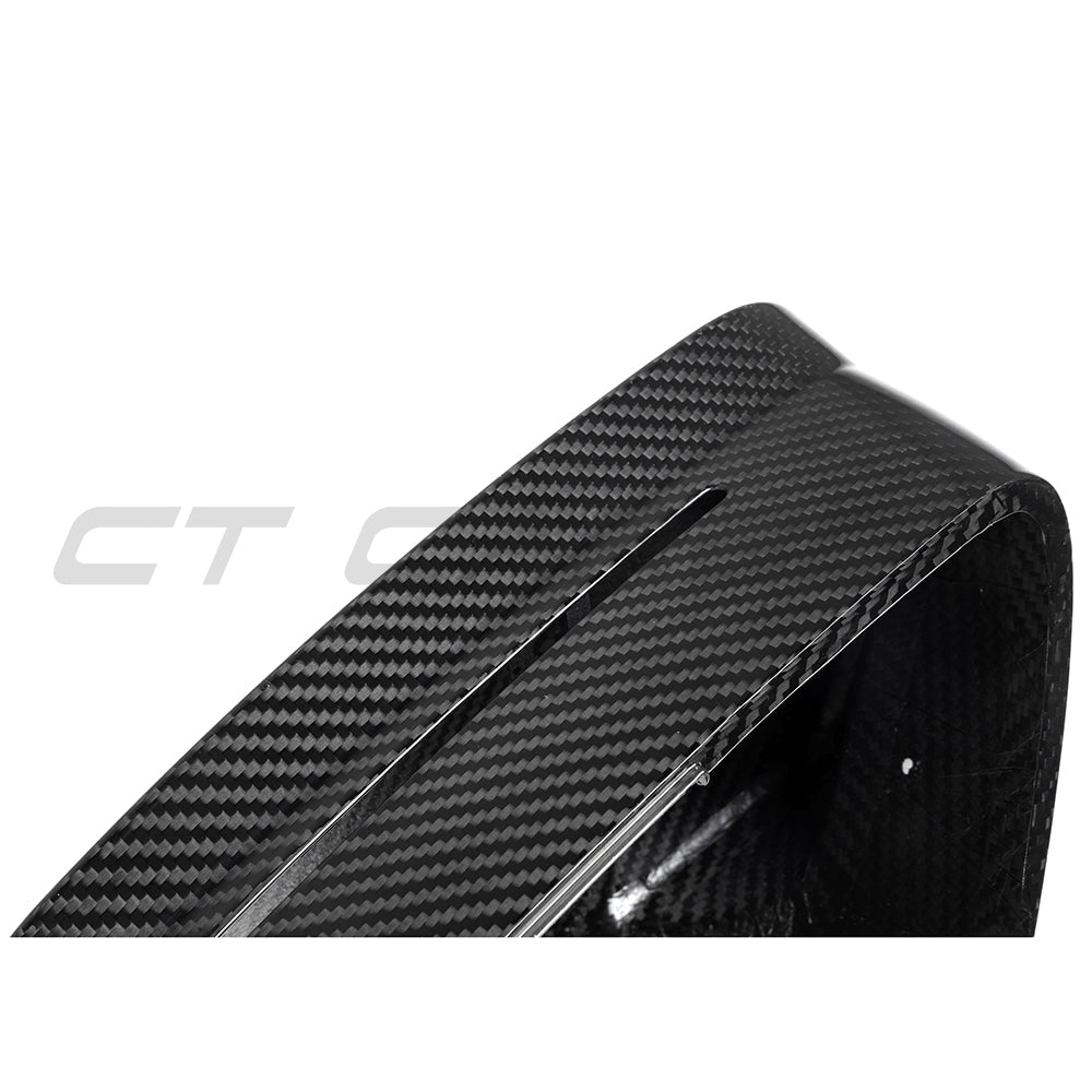 BMW M5 G90 G99 and i5 M60 G60 carbon fiber side mirrors by CT Carbon, showing sleek, pre-preg carbon fiber finish on LHD accessories.