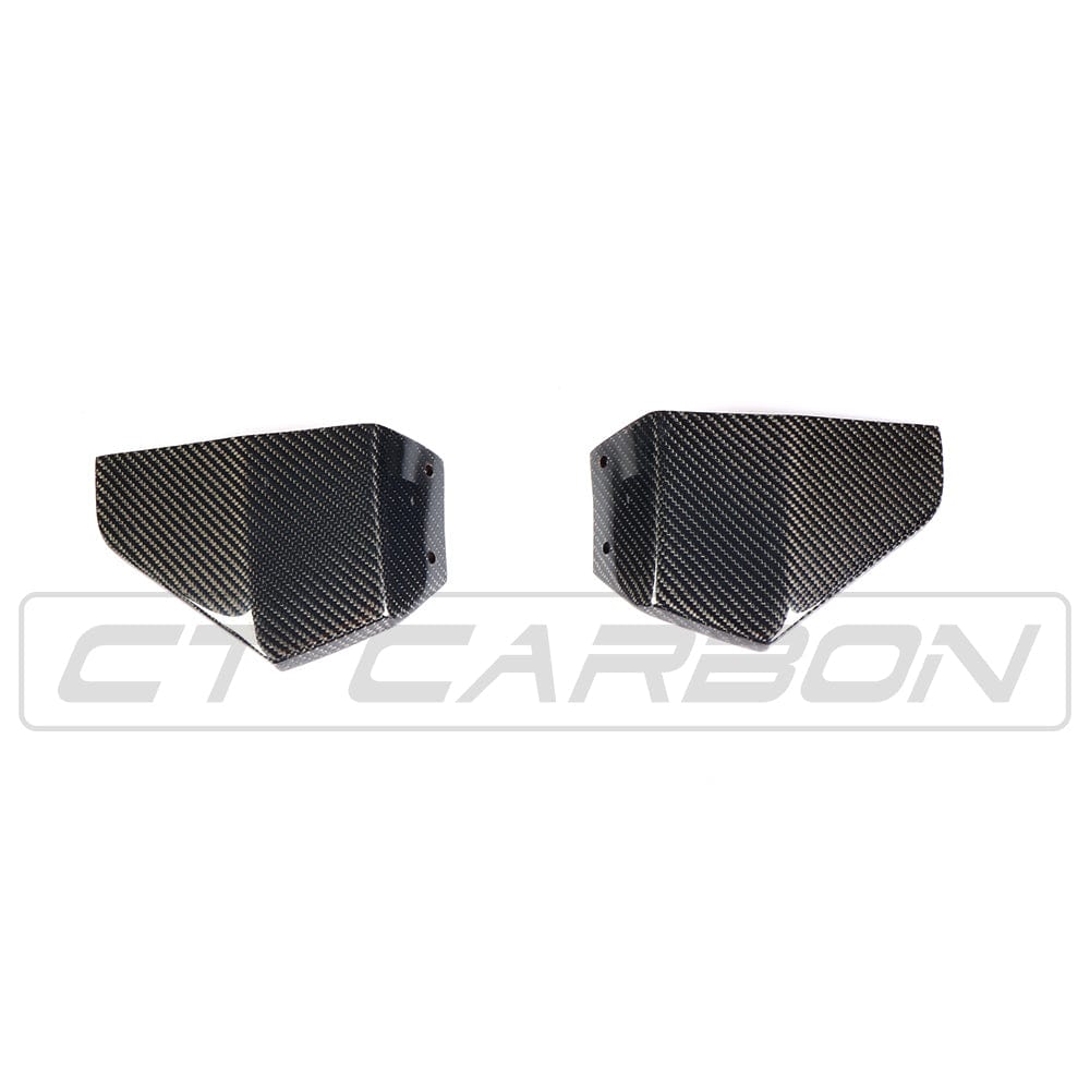 BMW X3 G01 2017-2021 CT Carbon carbon fiber corner splitters installed on the front corners of the vehicle.