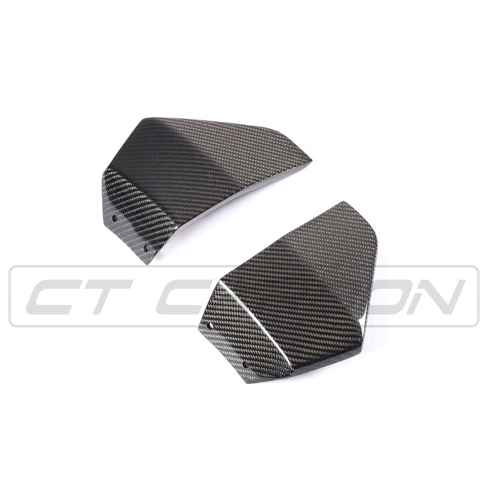BMW X3 G01 2017-2021 CT Carbon carbon fiber corner splitters installed on the front corners of the SUV.