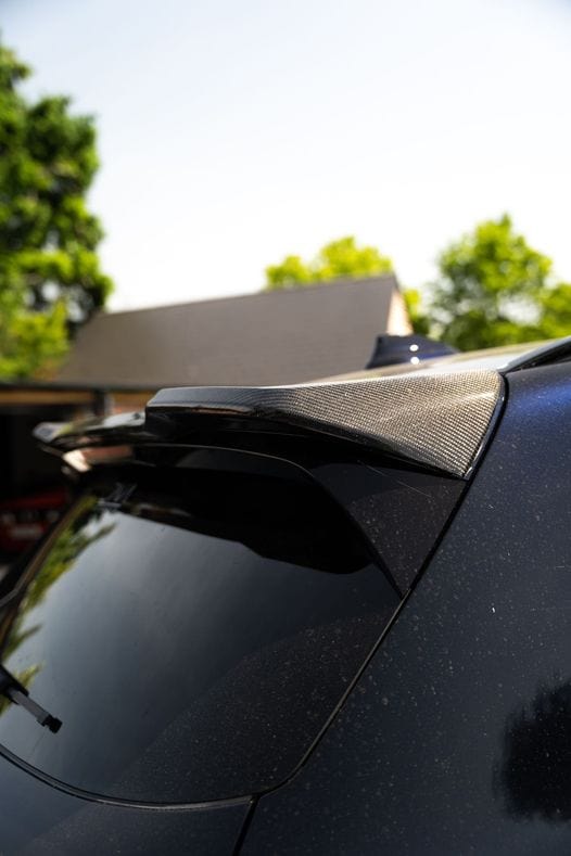 BMW X3 G01 carbon fiber spoiler by CT Carbon, showcasing the sleek, aerodynamic design on a 2017-2024 SUV.