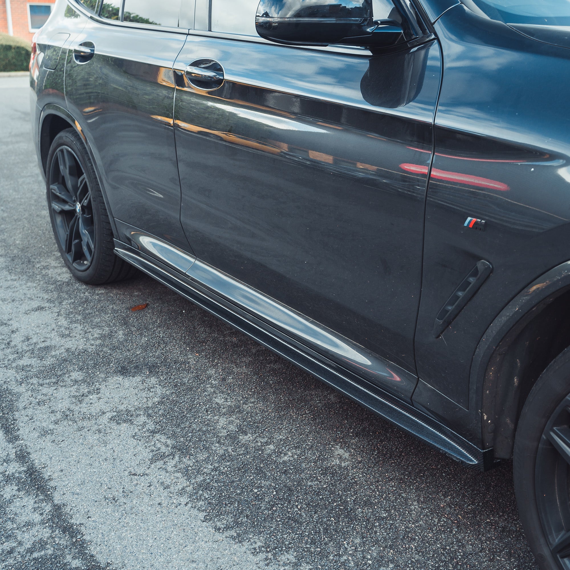 BMW X3M/X4M F97/F98 carbon fibre side skirts in 3D style, designed for models 2018-2021, by CT Carbon.