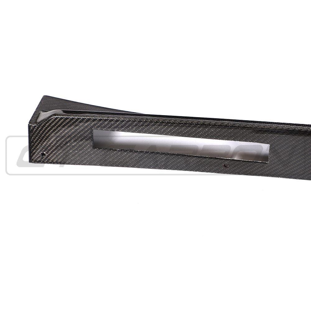 BMW X3M/X4M F97/F98 carbon fibre side skirts in 3D style by CT Carbon, shown on the vehicle for enhanced sporty look.