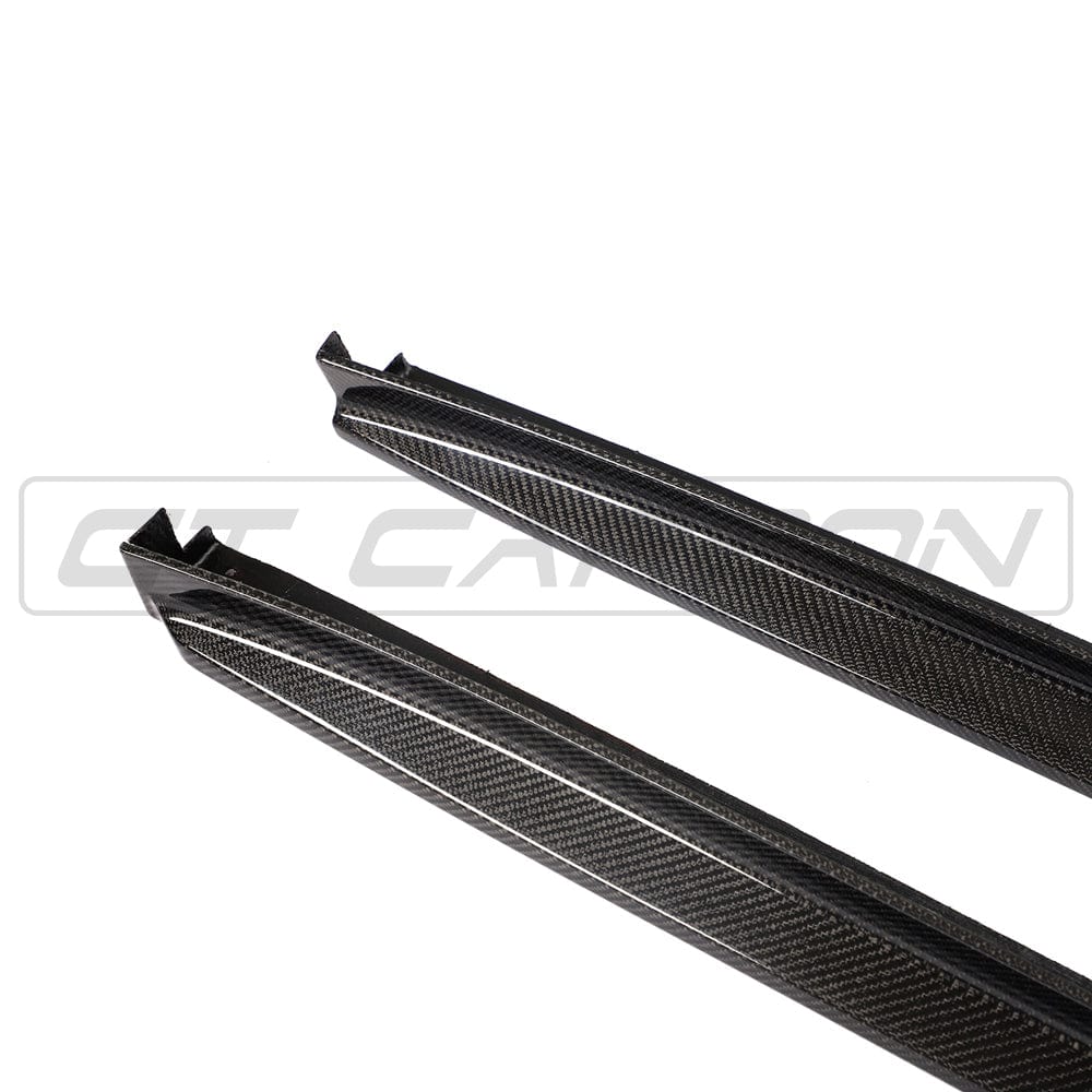 BMW X3M/X4M F97/F98 carbon fiber side skirts in 3D style by CT Carbon, showcasing sleek, textured design on vehicle sides.