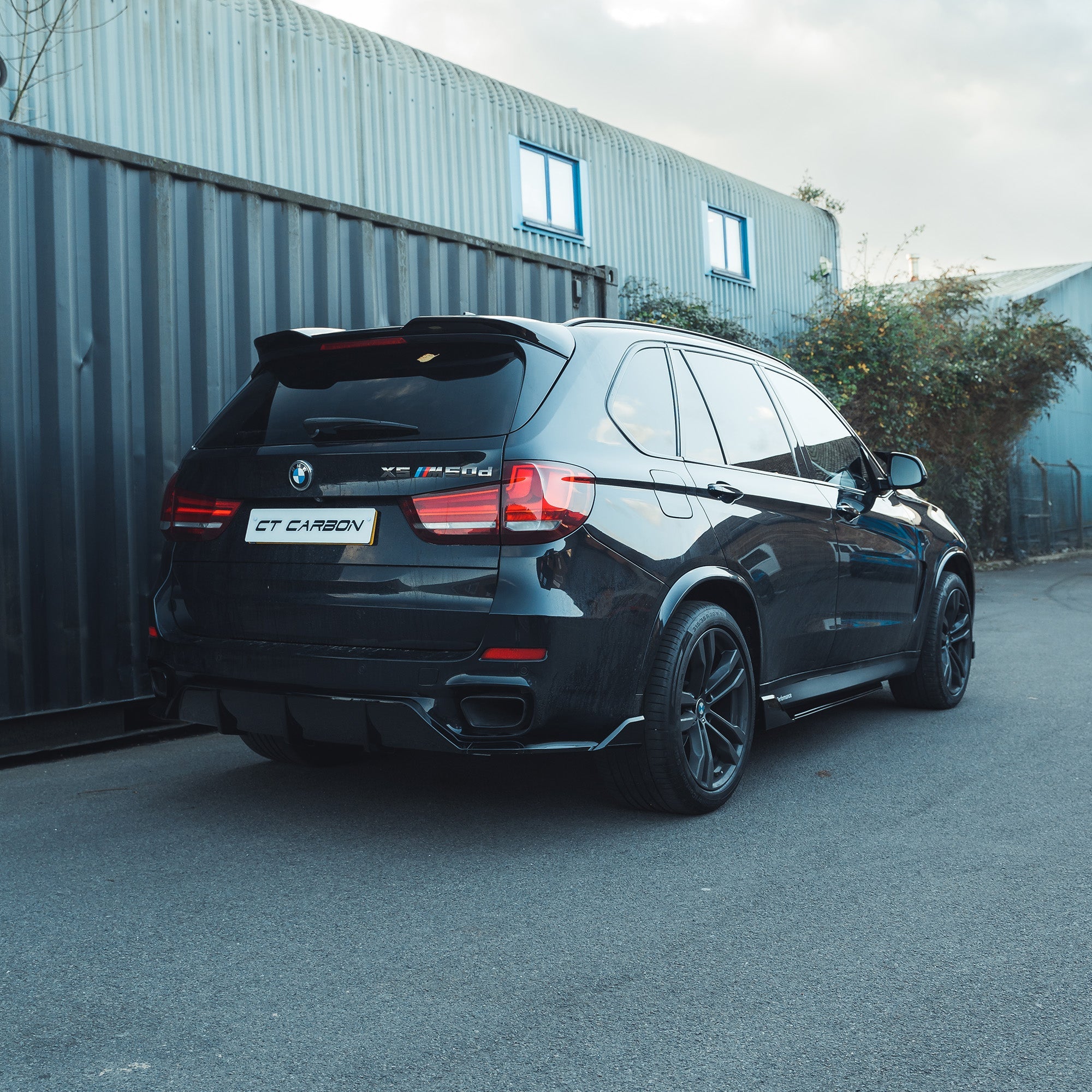 BMW F15 X5 2014-2018 full gloss black kit by CT Carbon, showing detailed view of the complete exterior upgrade components.
